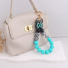 oly-819ebcb5fd3248261185007115bbab2b Wholesale Korean Style Silicone Cow Bow Keychain Charm Trendy Bag Car Key Accessory Gift