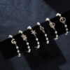 oly-829c8ea86e41b0cb2e16092457397299 Wholesale Cross Pearl Hollow Design Bracelet Fashion Jewelry Accessory Gift