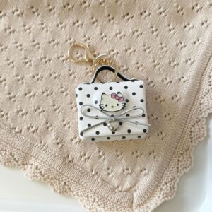 White polka dot cat head earphone bag