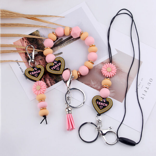 oly-8326f23e510e1c801763ae5c469ab312 Wholesale Cartoon Silicone Bead DIY Bracelet and Keychain Trendy Fashion Accessory for Women