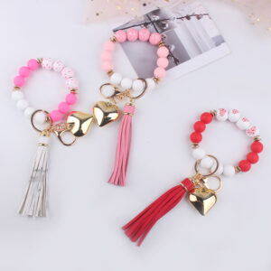 Wholesale Silicone Heart Bead Bracelet Keychain with Leather Tassel European Style Gift