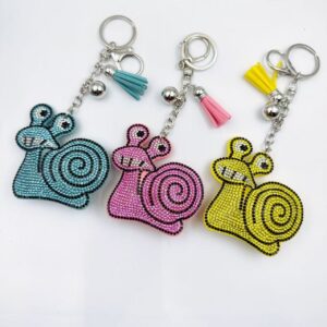 oly-8400ec0f796e6647115784f580d28e76 Wholesale Yellow Rhinestone Cartoon Snail Keychain Fashion Decorative Accessory
