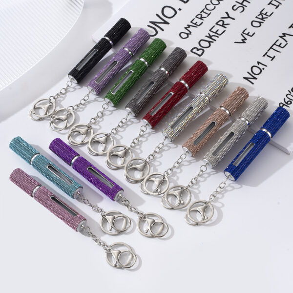 Wholesale Chic Light Purple Metal Rhinestone Perfume Atomizer Keychain for Women Gift Boutique Resale