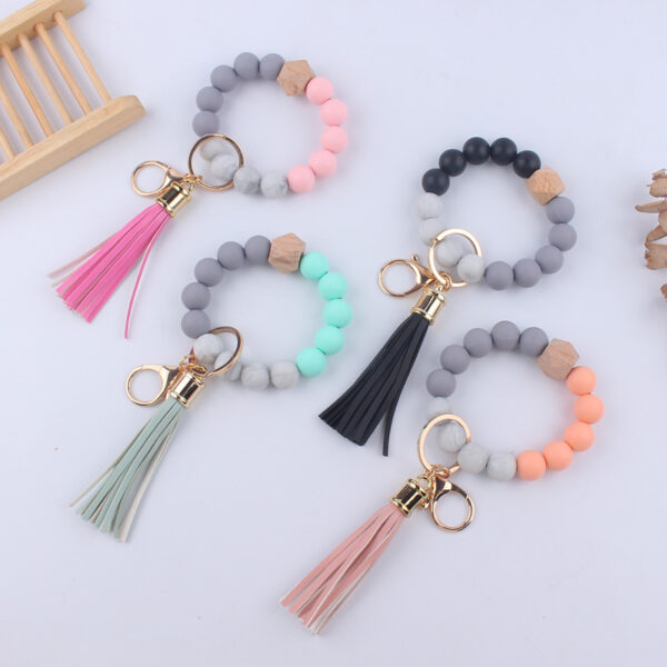 oly-853a094c0d0329b33523266c76a77451 Wholesale Leopard Print Silicone Wrist Keychain Fashion Accessory DIY Beaded Key Ring Gift