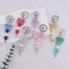 oly-877d04d02854641dda75bf5002c1dc65 Wholesale Silicone Bow Beaded Bag Charm Keychain Fashion Accessory Gift for Party