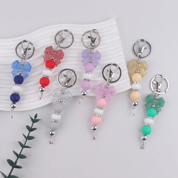 oly-877d04d02854641dda75bf5002c1dc65 Wholesale Silicone Bow Beaded Bag Charm Keychain Fashion Accessory Gift for Party