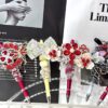 oly-8905a43a564ab97c7585b6ede46f3516 Wholesale Trendy Red Black Diamond Strip Tassel Flower Beaded Pen Fashion Accessory Gift