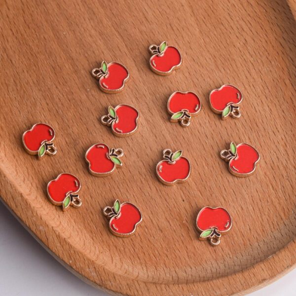 oly-893f5f6ce50127aa55b60f242e244743 Wholesale Alloy Red Pendant Charm Stylish DIY Phone Chain Bracelet Accessory for Everyday Wear