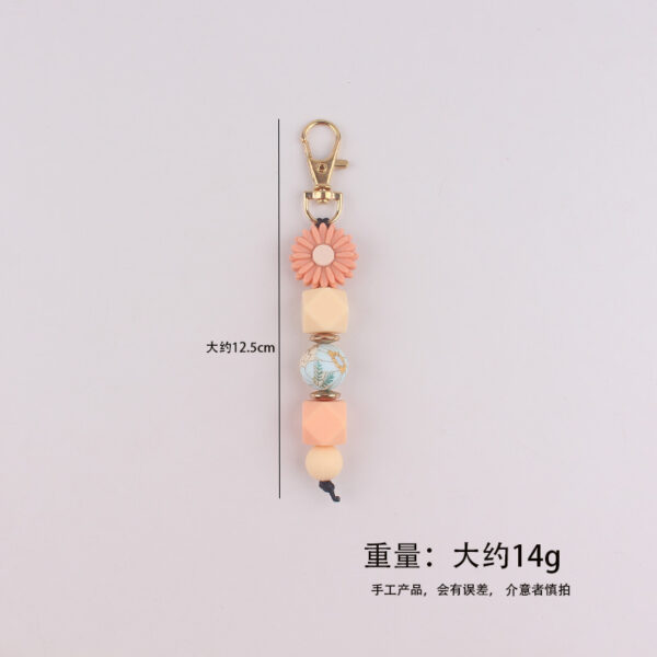 oly-8ab891cf3ee8e775fd441384a8afdfae Wholesale DIY Silicone Bead Keychain Bag Charm Decorative Accessory for Everyday Use