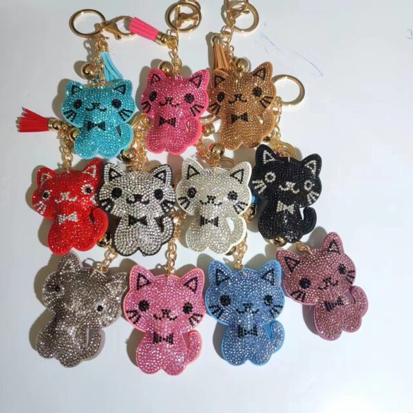 Wholesale White Alloy Cartoon Cat Rhinestone Keychain Bag Charm with Tassel Stylish Gift for Wedding Boutique Resale