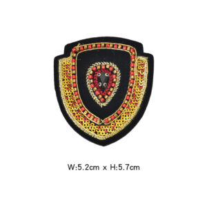 Gold shield-shaped badge