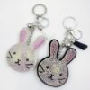 oly-8ca3780652b0989dd0722502add040d5 Wholesale Rhinestone Rabbit Keychain with Tassel and Bell - Cute Bunny Key Ring for Wedding Favor, Decorative Accessory