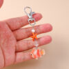 oly-8e5ed0e9a2a8c1fbe93a6d83ea06495d Wholesale Resin Starfish Clownfish Keychain Trendy Ocean Animal Key Ring for Gifts