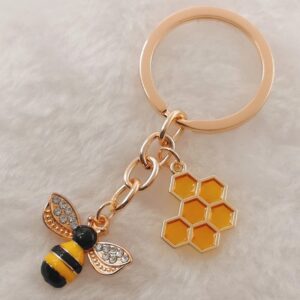 oly-8ead2fcee0880a34d5944656d2de381c Wholesale Hexagonal Honeycomb Bee Keychain Pendant Fashion Accessory Boutique Resale