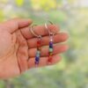 oly-8f206dd95c71fd8c086a4dab228f292c Wholesale Metal Keychain with Natural Crystal Beads Mediterranean Style Bag Pendant for Gift or Resale