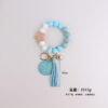 oly-90abf9f1bacca7ce022ca6e5f506e31c Wholesale Silicone Keychain Retro Face Wooden Plaque Tassel Wristlet Party Gift for Junior