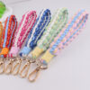 oly-91b4b2dbe41c67e8e0189662b2ce12b5 Wholesale Handwoven Cotton Rope Keychain in Red Bag Charm Phone Strap Gift for Women