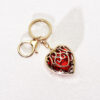 oly-949ebcc079f60a425201eae96897e780 Wholesale Fashion Metal Heart Keychain Pendant, Red Hollow Design, European Style Bag and Key Accessory OLY Exclusive