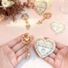 oly-94cc421e06ccf8afb431b7379a59674d Wholesale Gold Rhinestone Bow Pearl Keychain Wedding Favor Decorative Accessory