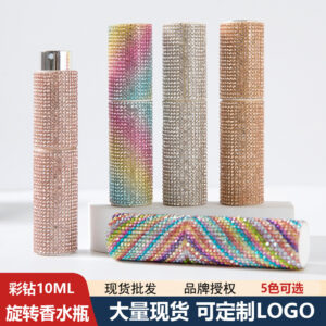 oly-95854099d066e3a54e3639d0c9e5a0bb Wholesale Metal Perfume Atomizer Bottle with Rotating Colored Diamond Design Portable Keychain Refillable Spray for Wedding Gift