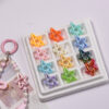 oly-96f53e176c7b4e22747636a561f1644b Wholesale Y2K UV Plated Five Point Star Acrylic Beads for DIY Keychain Fashion Accessory