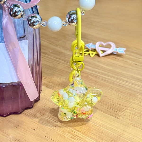 Wholesale Acrylic Five pointed Star Keychain Oil filled Bubble Bead Design, Stylish Bag Charm for Business Gifts