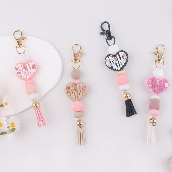 oly-976812dd82527a9b8a4281a4e21a9e50 Wholesale Silicone Heart Keychain Bag Charm Korean Style Pink Tassel Pendant Gift