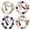 oly-97e0143fcc1a7d714ddf22d2421d37a8 Wholesale Silicone Cartoon Cow Keychain with PU Leather Tassel Fashion Accessory Bag Charm for Gift Boutique Resale