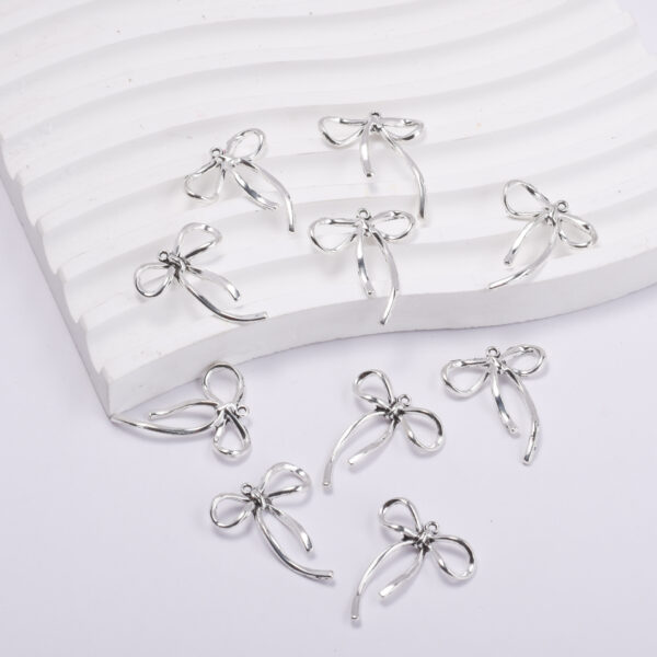 Wholesale Chic Bow Pendant Alloy Baking Paint DIY Jewelry Accessory for Necklace Keychain Craft