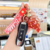 oly-9e53a097339f45479d850611b7448f67 Wholesale Decorative Pink Hot Air Balloon Acrylic Keychain with Oil Filled Quicksand Bag Charm Gift