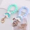 oly-9f82ab7d635d440e8928f79cb35b6c54 Wholesale Silicone Rainbow Beaded Keychain Fashion Accessory for Keys Bag and Gift