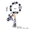 oly-9f862d9800dc8420a532e4349e48db82 Wholesale Silicone Cartoon Cow Head Keychain with Bead Bracelet and Tassel Korean Style Decorative Accessory