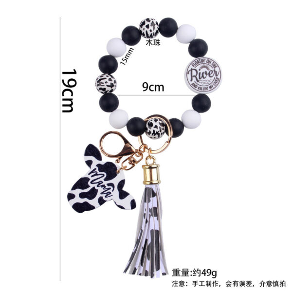 oly-9f862d9800dc8420a532e4349e48db82 Wholesale Silicone Cartoon Cow Head Keychain with Bead Bracelet and Tassel Korean Style Decorative Accessory