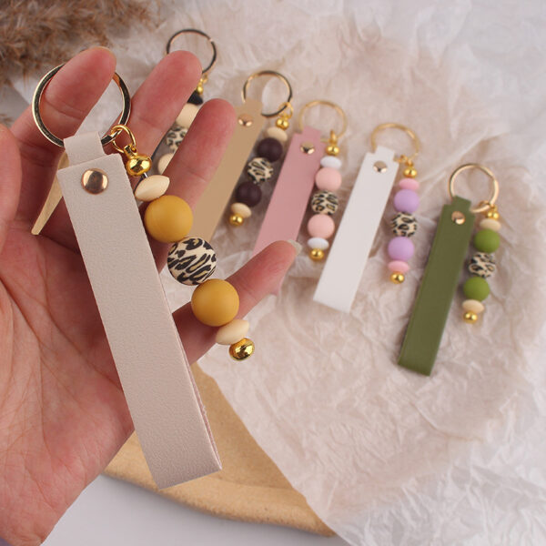 oly-a108939b3decf8b61ab75a5a1af23e4d Wholesale Stylish Silicone Khaki Keychain Pendant - Boutique Resale Bag Charm Gift