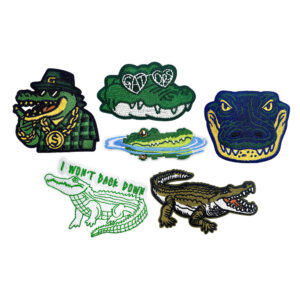 oly-a147a94e395aaf770cb7b4d33c786c98 Wholesale Trendy Cartoon Crocodile Embroidered Patch Iron-On DIY Accessory for Shoes Hats