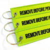 Wholesale Grass Green Flight Tag Keychain with Remove Before Pew Pew Text - Car Key Accessory Gift