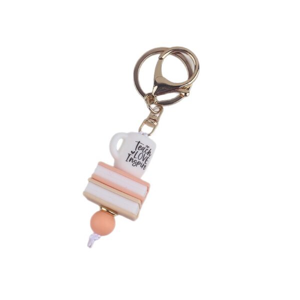 oly-a4318598094e9691b1a526b8aebc1d86 Wholesale Trendy Book Silicone Keychain Handmade Beaded Purple Heart Charm Resale Gift