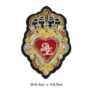 Gold and red heart-shaped crown badge
