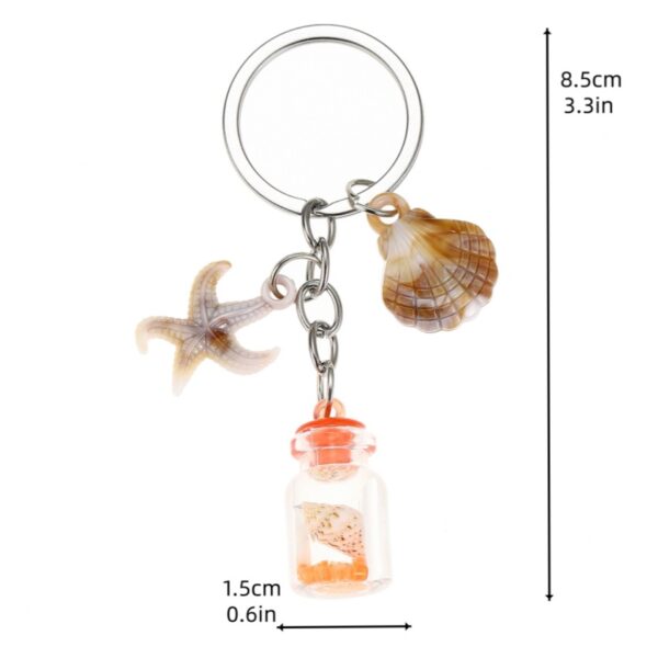 oly-a50ab56492dc575f5941a379bf3dbddb Wholesale Luminous Seashell Keychain Seaside Vacation Decorative Accessory Gift