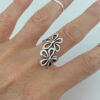 oly-a531d83ae64e53ee15b5d29a3441210b Wholesale Alloy Silver Hollow Flower Ring Vintage Style Fashion Jewelry Accessory for Women