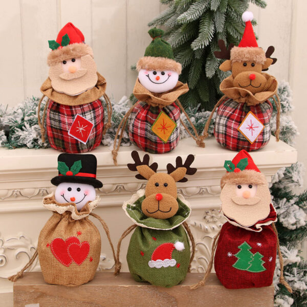oly-a5c1e710db5bca7fbe657e6ac44e4883 Wholesale Burlap Christmas Gift Bag Cartoon 3D Drawstring with Jingle Bell Holiday Decor