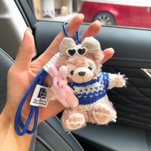 Blue sweater holding pink rabbit [shirley rose] / Approximately 10cm, comes with a rope stopper