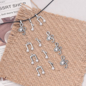 oly-a5f8930cb1fd6f97bebcc6d51125dbc8 Wholesale Zinc Alloy Electroplated White Music Note Pendant DIY Keychain Accessory Fashion Craft Supply