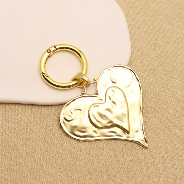 oly-a61a0e722a5b0fcc25b64dfdcc602d26 Wholesale Retro Geometric Bohemian Keychain Pendant Zinc Alloy Trendy Gift