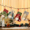 oly-a6f19d1e7a9b234e5e29106cc79e296d Wholesale Korean Style Red Christmas Stockings Gift Bags for Holiday Party Decorative Accent