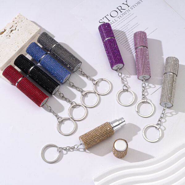 oly-a7886f2e09555eee751c2cb0f1f57d3c Wholesale Rhinestone Creative Metal Perfume Bottle Keychain for Women Trendy Key Chain Accessory for Wedding or Everyday Gift