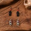 oly-a8a708ff6258e99e97d79f305a51c5e4 Wholesale Retro Zinc Alloy Halloween Earrings Black Skull Pendant Fashion Accessory