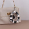 oly-a8ece6ba2bcfe5c05cbb844d0389b0bb Wholesale Western Cowboy Silicone Beaded Bracelet Keychain Trendy Tassel Bag Charm for Party Gifts
