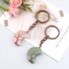 oly-a994fce837e1d9954ee816a06239ad14 Wholesale Natural Stone Moon Bag Charm Trendy Car Key Accessory for Daily Use