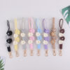 oly-a9dc6f4091ba119bb19c973c3a35d1a5 Wholesale Pearl Flower Handwoven Phone Strap Candy Color Cute Keychain for Women Casual Gift Decorative Accessory